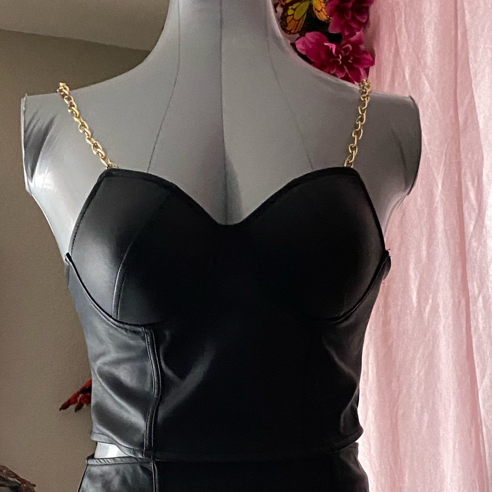 Two pc leatherette skirt set with chain straps